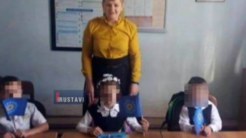 პირველკლასელები "ქართული ოცნების" დროშებით