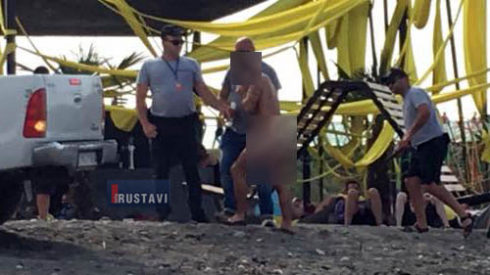 შიშველი მამაკაცი დააკავეს (ფოტოები)